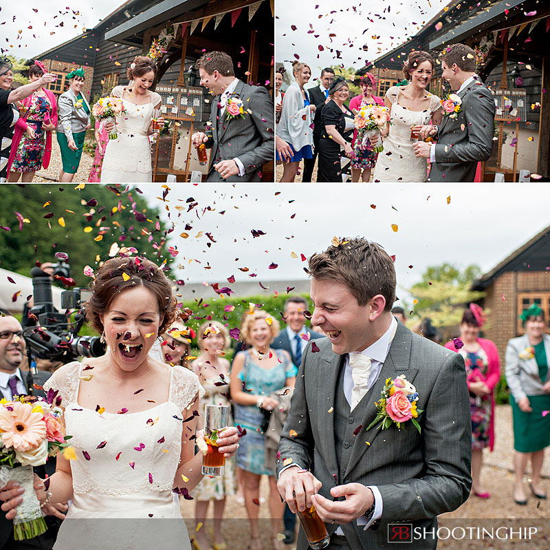 cofetti throwing at a wedding at gate street barn