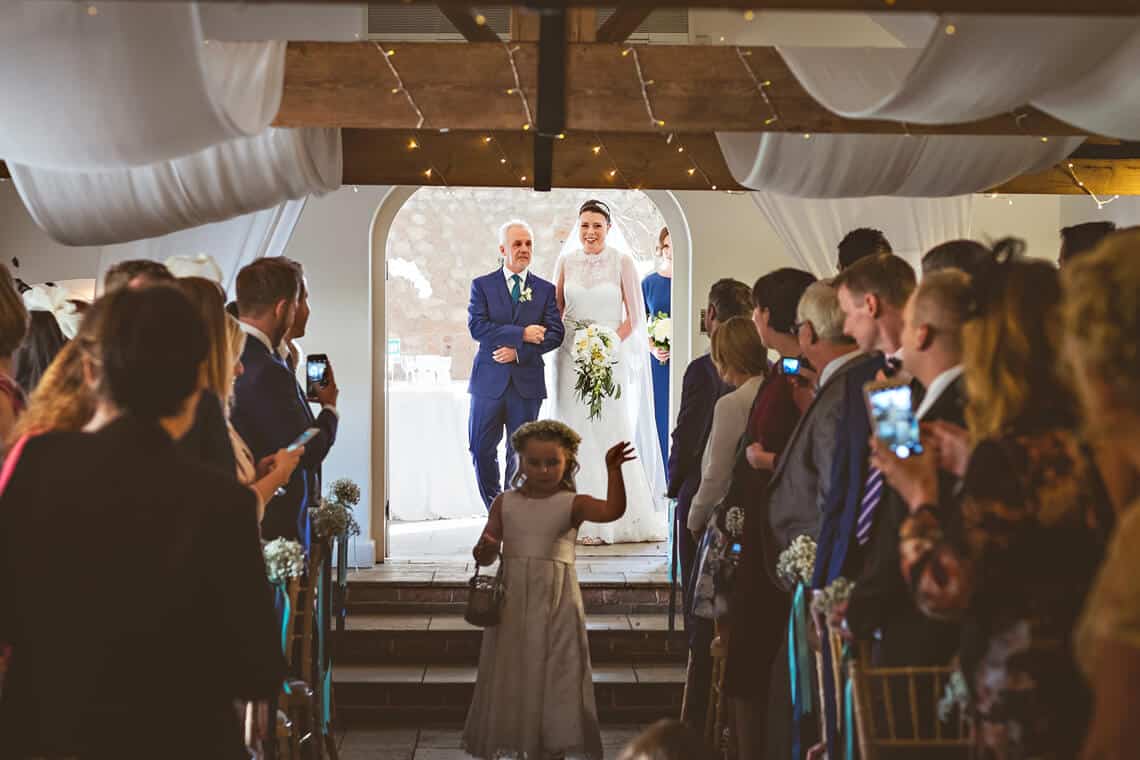 Bride walking down the aisle at Farbridge