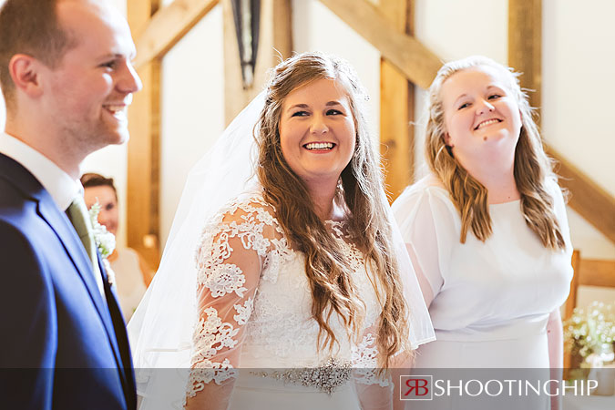 Bride laughing at Groom at Gate Street Barn