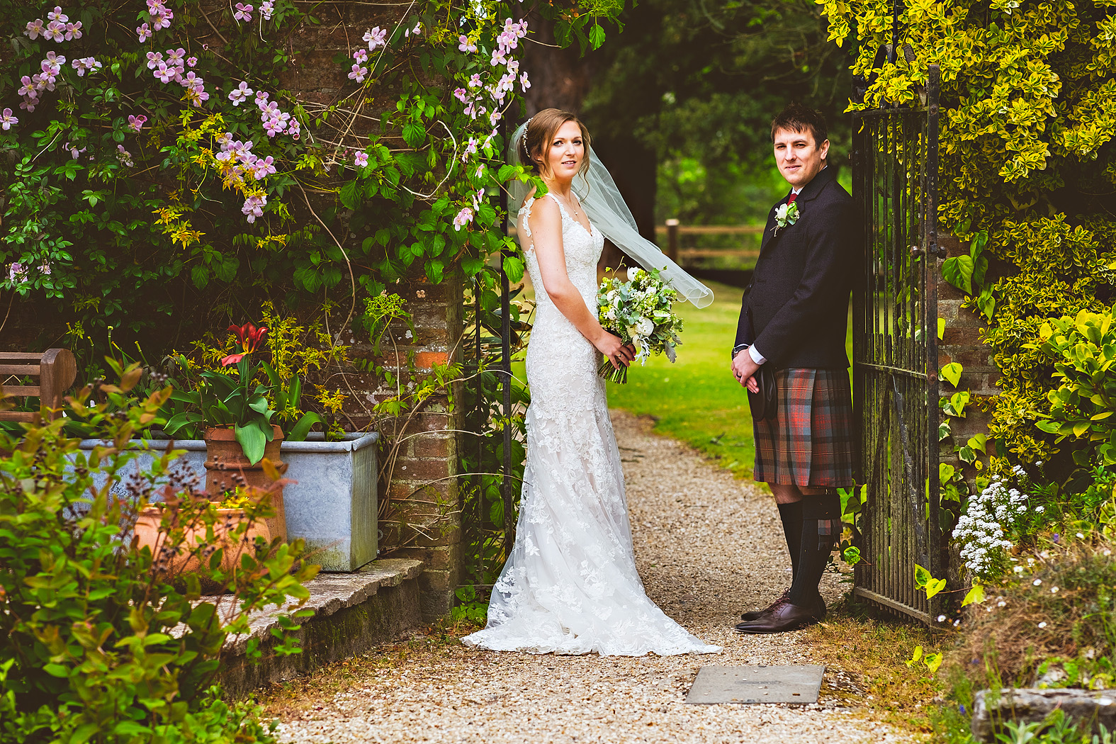 country garden bride and groom at careys manor new forest