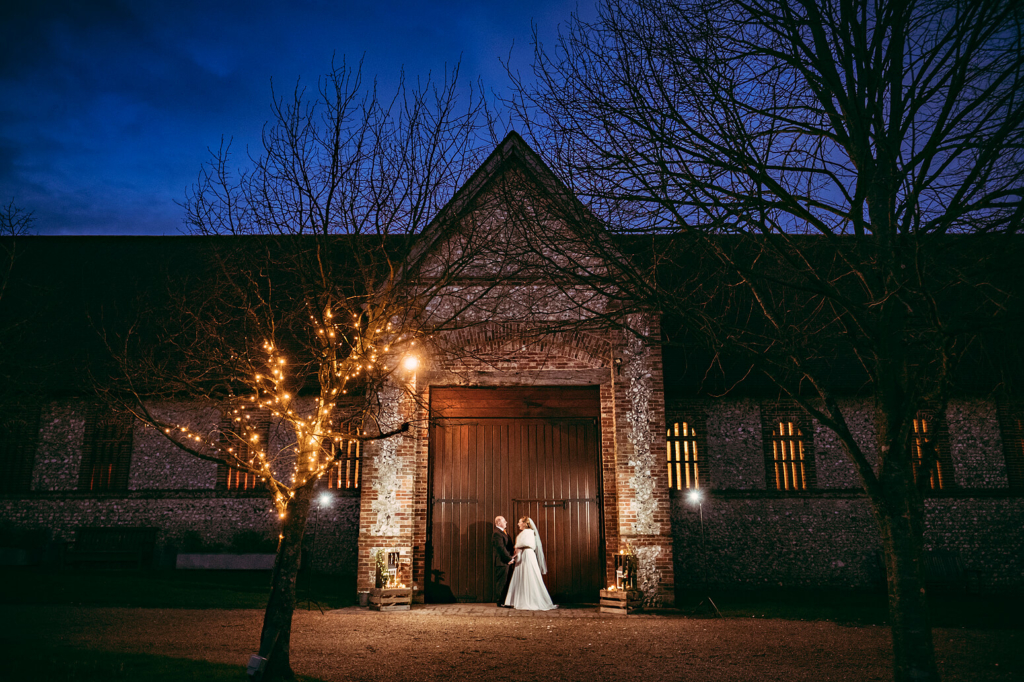 Night time couple photography at Tithe Barn