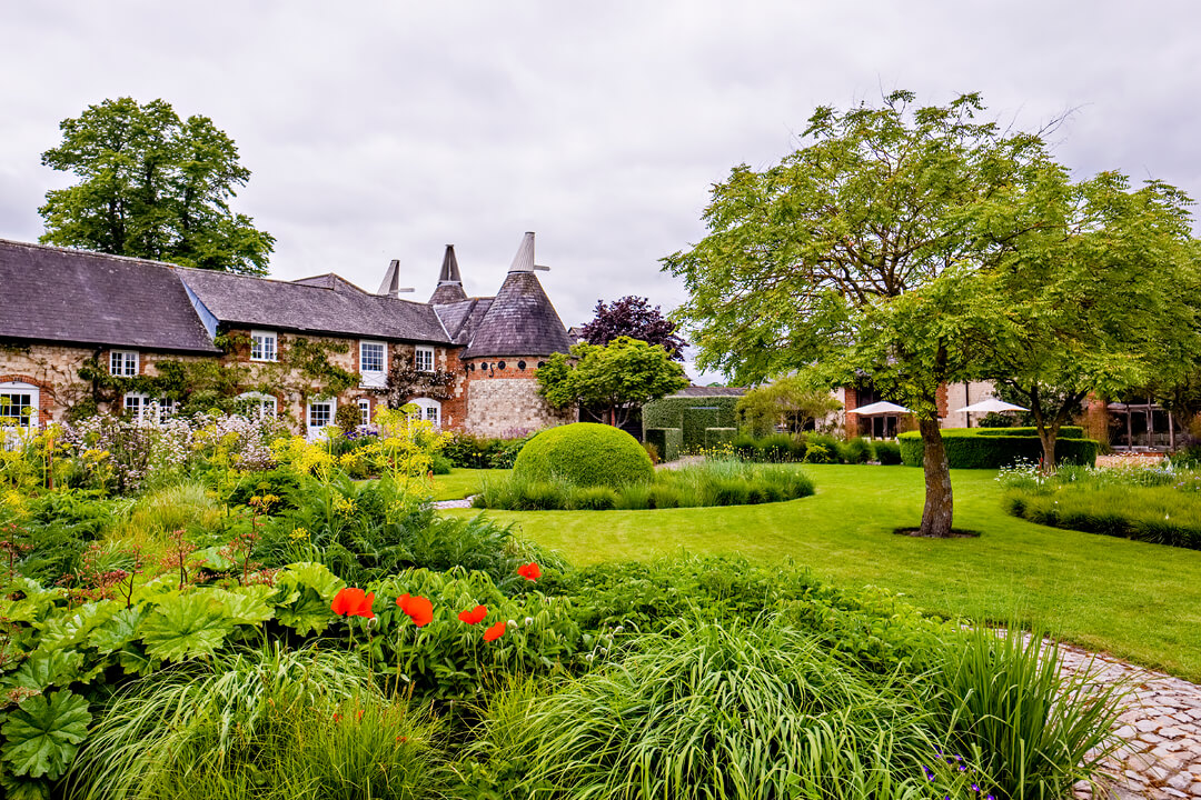 The gardens at Bury Court Barn in Surrey