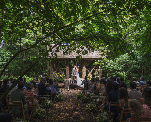 Woodland wedding bride and groom gate street barn